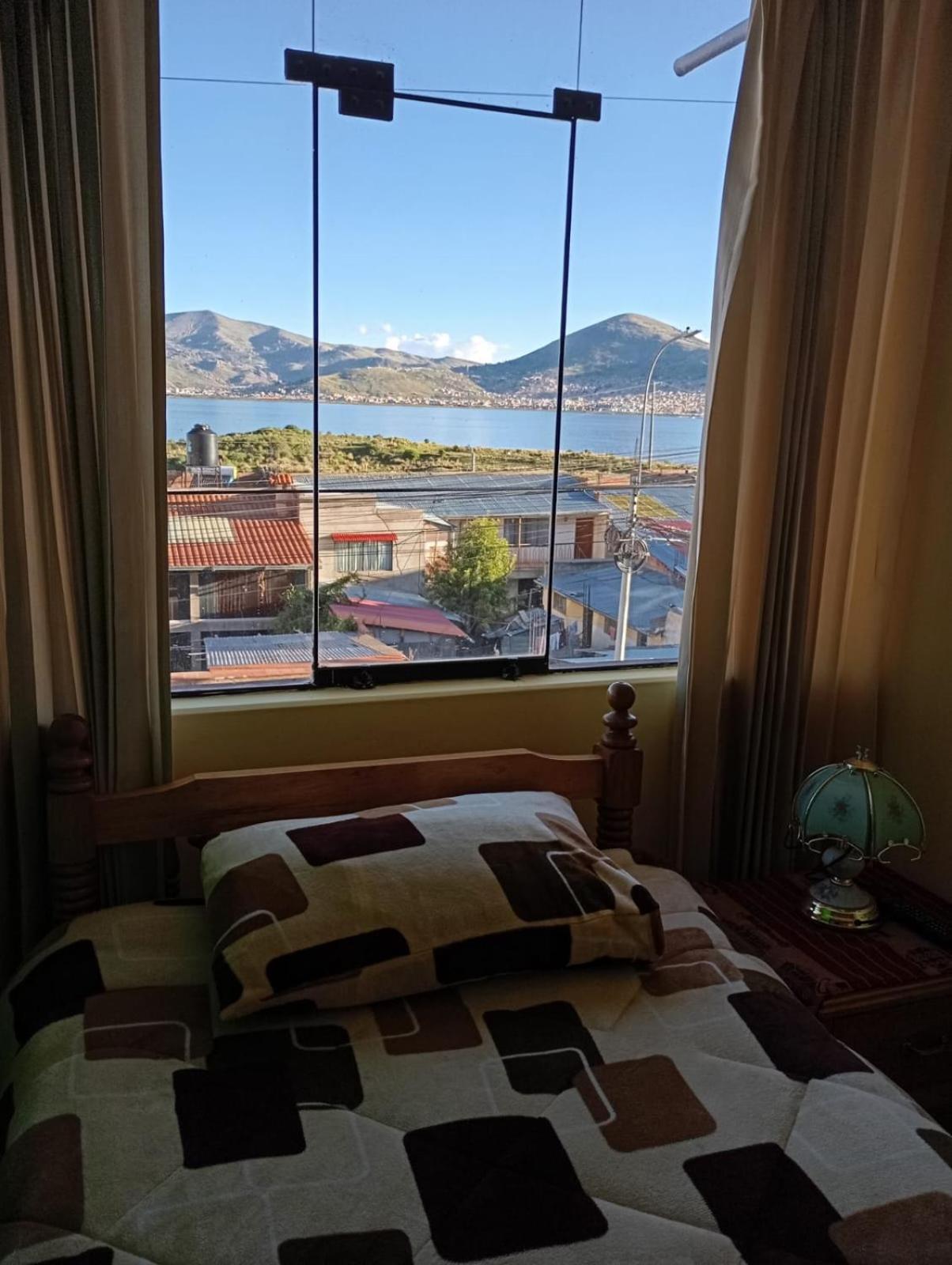 Hostal Vista Al Lago Titicaca Puno Exterior foto